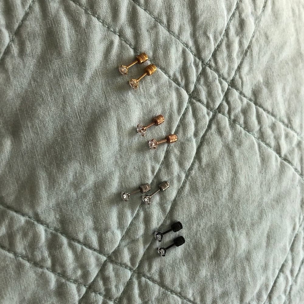 Set of four surgical stainless steel screw in backs